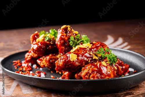 fried bbq chicken wings in plate