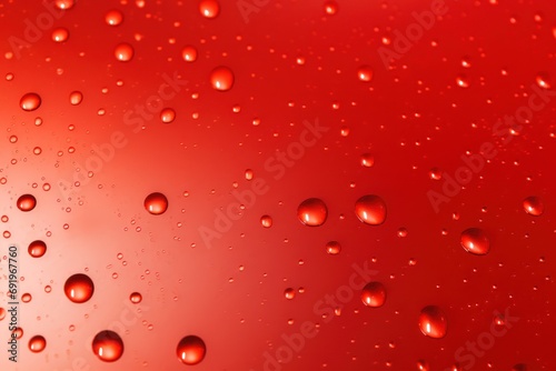  drops of water on a red surface with a red back ground and a red back ground with a red back ground.