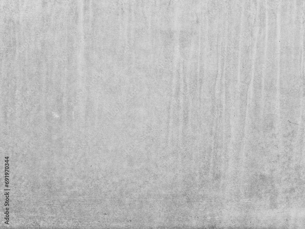 Gray cement concrete background with smudges.