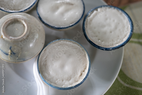 Thai call Kanom Tuay or Steamed Coconut Milk traditional Thai desserts