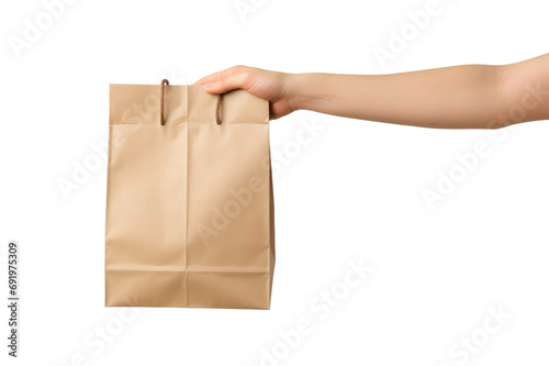 main qui tient un sac en papier comme pour une livraison de repas à domicile - fond transparent photo