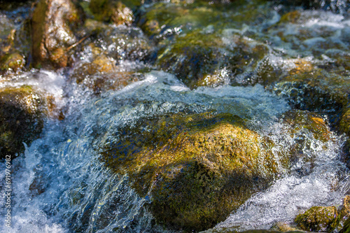 Feel the tranquility of a picturesque mountain stream. Escape the noise and find peace in nature. Listen to the soothing sound of flowing water.