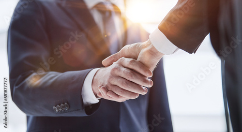 People Shaking Hands at Meeting Close Up photo