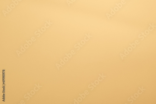 Panorama de fond uni en papier jaune pastel pour création d'arrière plan.	 photo