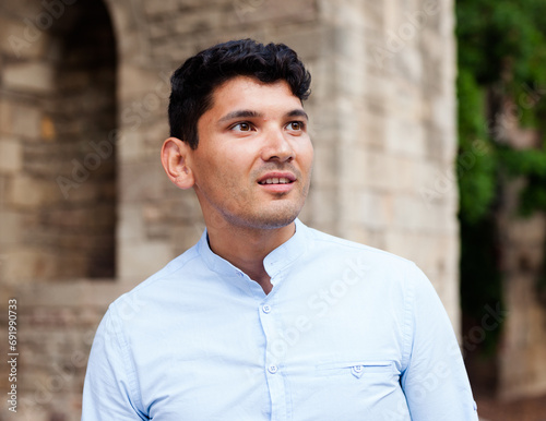 Portrait of man in European city © caftor