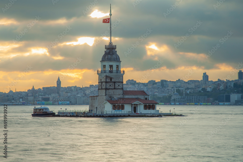 Maiden's Tower one of the touristic points of Istanbul city and photographs taken at sunset and blue hours