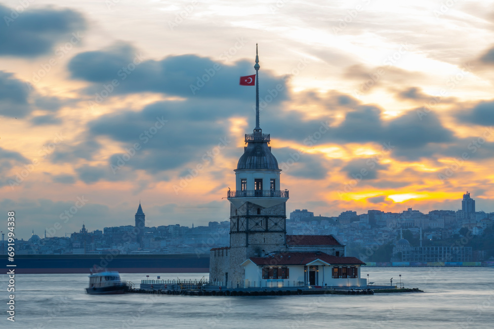 Maiden's Tower one of the touristic points of Istanbul city and photographs taken at sunset and blue hours
