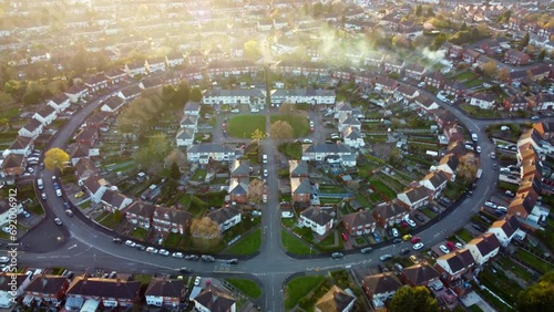 Residential area making a circular round shape at sunset. Aerial view. photo