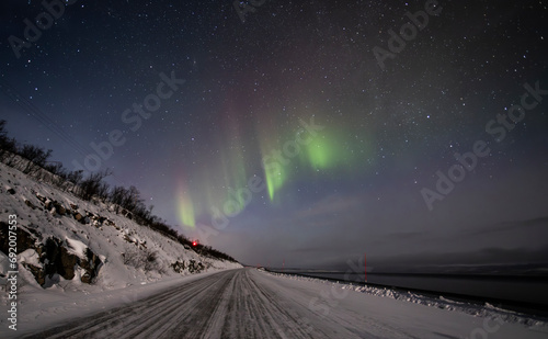 Fototapeta Naklejka Na Ścianę i Meble -  Northern lights over Abisko area during December, Sweden