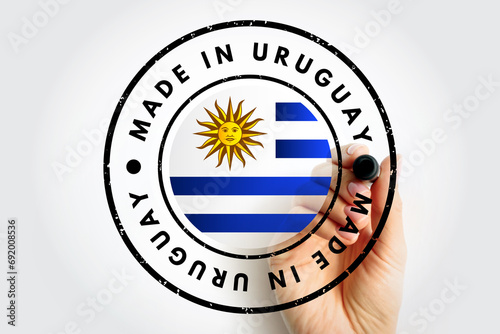 Made in Uruguay text emblem stamp, concept background photo
