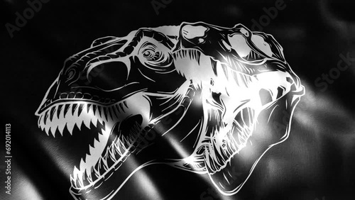 flag in loop of Tyrannosaurus rex skull fossil silhouette in black background photo
