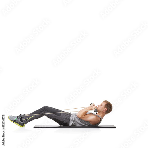 Exercise, man and resistance band with fitness, energy or wellness isolated on white studio background. Mockup space, person or model with workout, health or progress with cardio, crunch or endurance