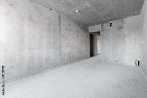 interior of the apartment without decoration in gray colors. rough finish