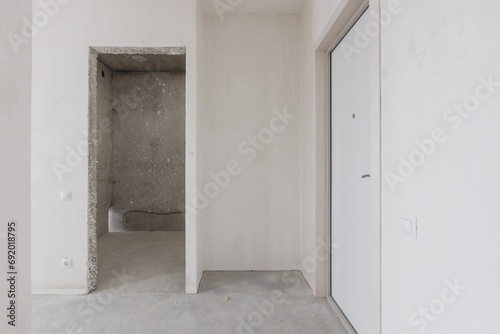 interior of the apartment without decoration in gray colors. rough finish © gluschenkoart