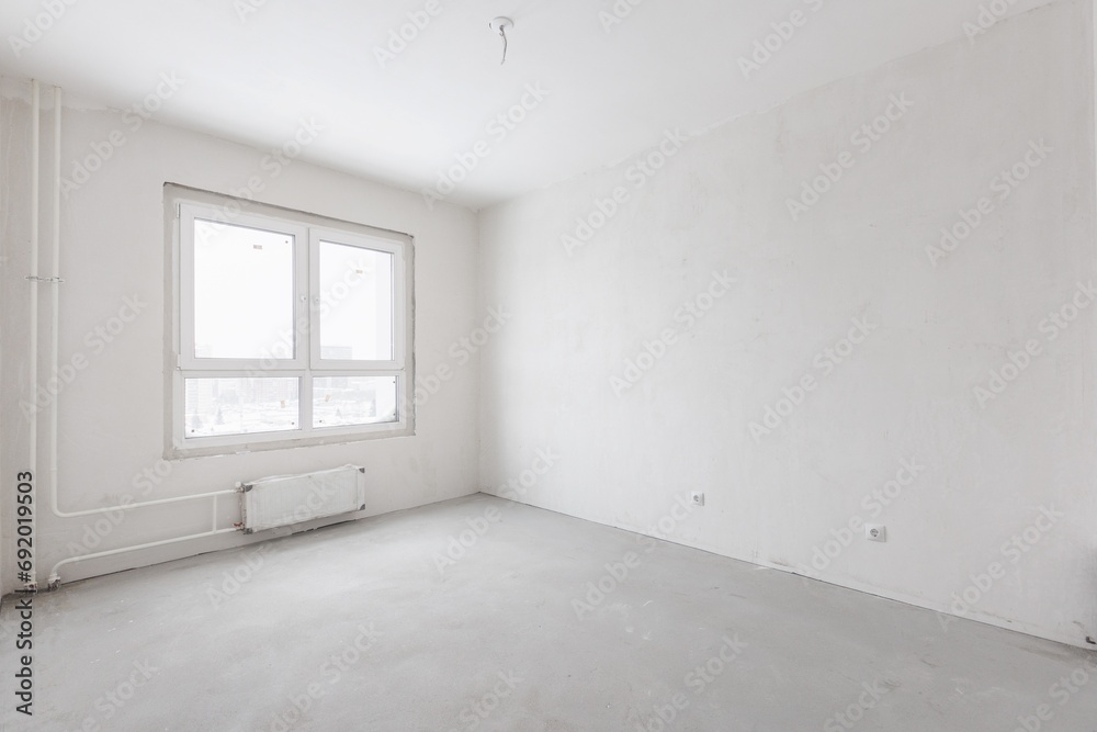 interior of the apartment without decoration in gray colors. rough finish interior of the apartment without decoration in gray colors. rough finish