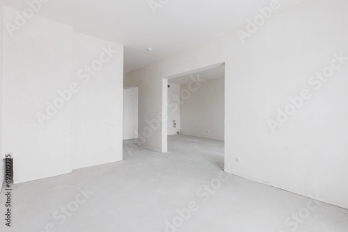 interior of the apartment without decoration in gray colors. rough finish