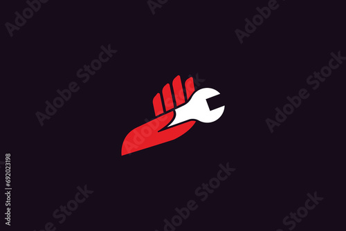 Hand with wrench logo design icon vector template