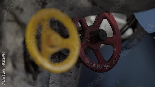 Hand wheels on valves of steam pipeline