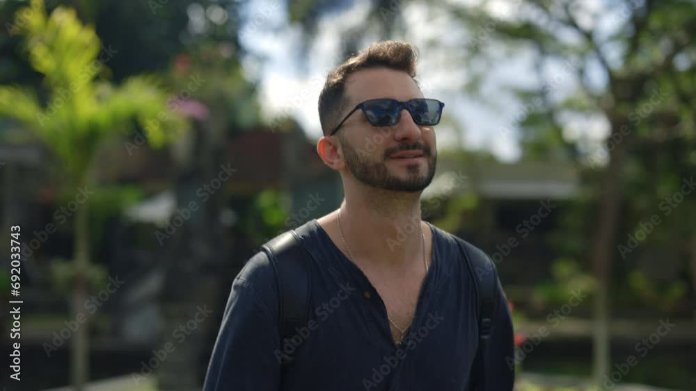 Interested Man Handsome Tourist Walking in the Destination, Wearing Sun Glasses and Exploring New Place.