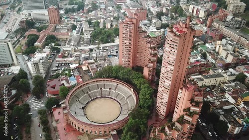 Aerial drone shot of Bogota downtown with Santamaria Bullring or Plaza de Toros de Santamaria, Colombia, Latin America. High quality 4k footage. photo