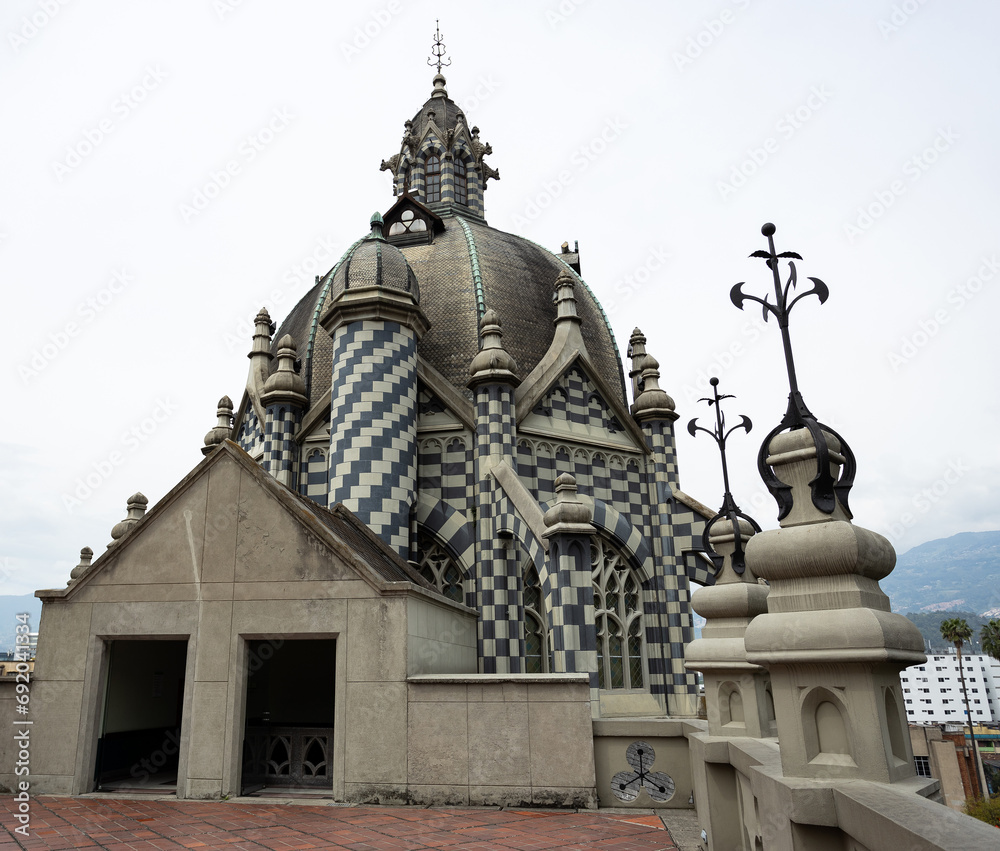 Medellin, Antioquia. Colombia - December 6, 2023. In Plaza Botero is the Rafael Uribe Uribe Palace of Culture, which stands out for its Flemish Gothic or Neo-Gothic style. Built in 1925 Medellin, Antioquia. Colombia - December 6, 2023. In Plaza Botero is the Rafael Uribe Uribe Palace of Culture, which stands out for its Flemish Gothic or Neo-Gothic style. Built in 1925