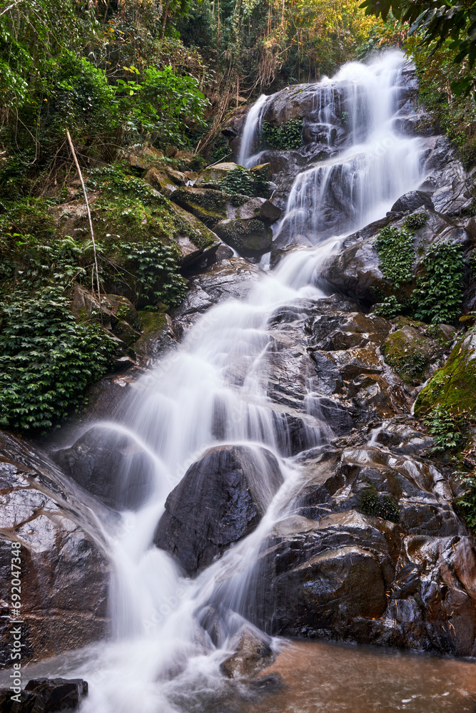 waterfall in the jungle in northern thailand waterfall in the jungle in northern thailand