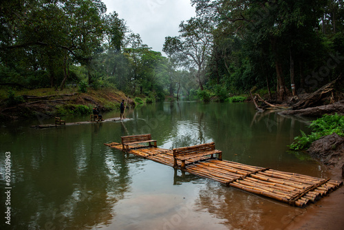6th December, 2023, Chitrakote falls, Jagdalpur, India: Tourist enjoying bamboo rafting at Kanger dhara near Kanger valley national park, Chattisgarh. photo