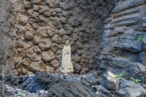 Madonna Figur in den Felsen bei Ribeira da Janela, Madeira photo