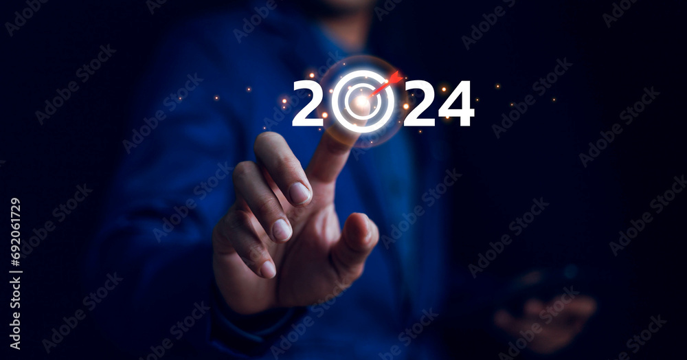 Business plan 2024 concept, business goals trends 2024, Analytical businessperson planning strategy to growth market, 2024 business target icon, challenge operation to target on new year, goal plan. Business plan 2024 concept, business goals trends 2024, Analytical businessperson planning strategy to growth market, 2024 business target icon, challenge operation to target on new year, goal plan.