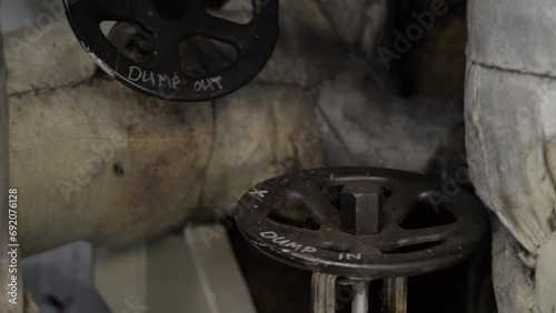 Hand wheels on valves dump in and dump out of auxiliary steam boiler