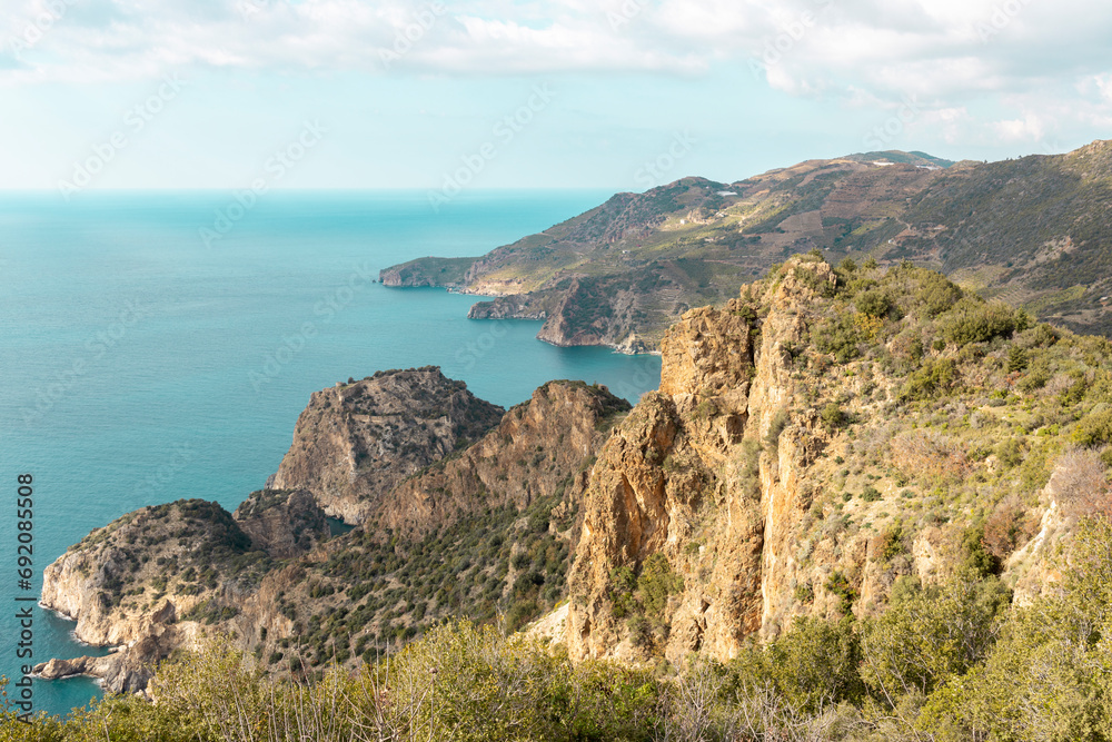 Seascape overlooking the rocky part of the coast at noon