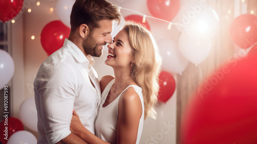 Couple is closely embracing and smiling at each other amidst a festive background