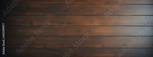 View from the top of an old brown tabletop. Solid background of wooden planks for background and design.