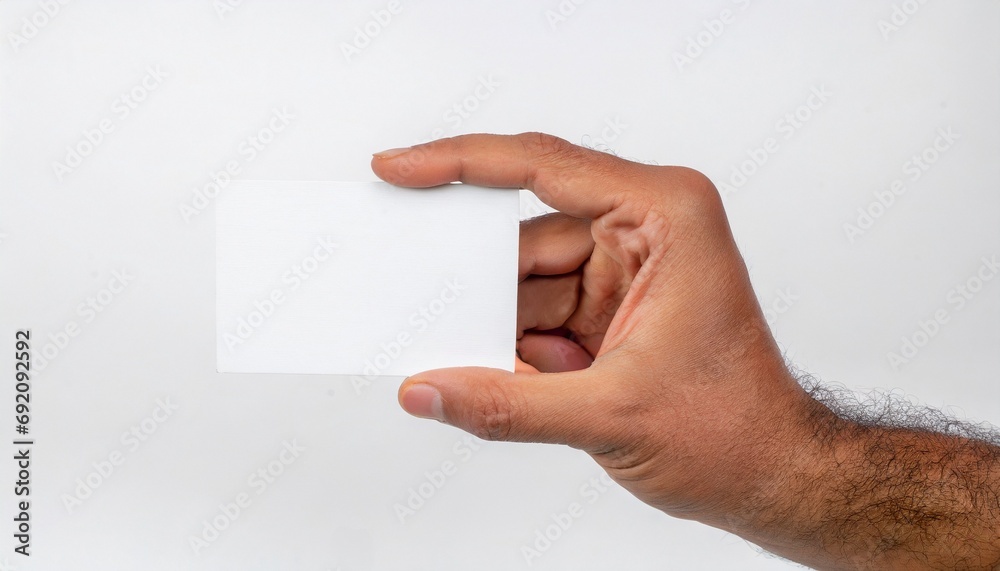 Obraz premium Man hand holding a blank card isolated on a white background