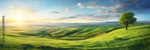 Captivating view of lush green fields under a serene blue sky with fluffy white clouds