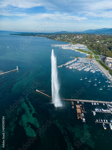 Aerial view of a jet fountain in a marina on a sunny day photo