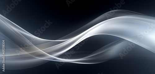 A sliver of light pierces the gray abstract background.
