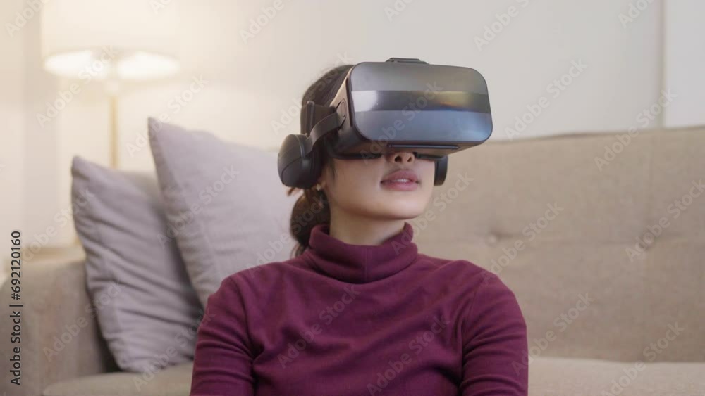 young asian woman in glasses of virtual reality technology VR experience young asian woman in glasses of virtual reality technology VR experience