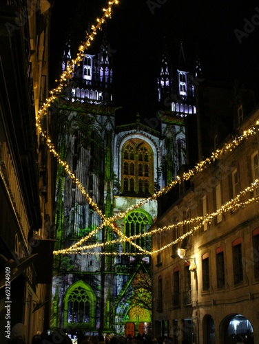 Quimper, Bretagne, France; December 8 2023: Light show at Saint Corentin Cathedral for Noël. Christmas ambiance and decoration. photo