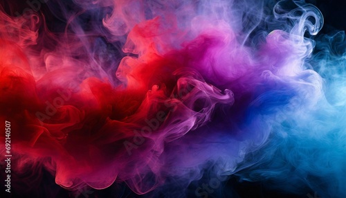dramatic smoke and fog in contrasting vivid red blue and purple colors vivid and intense abstract background or wallpaper