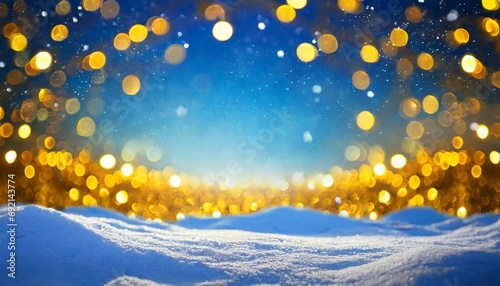 festive christmas natural snowy landscape abstract empty stage background with snow snowdrift and defocused christmas lights blue and yellow golden christmas lights against blue sky copy space © Emanuel