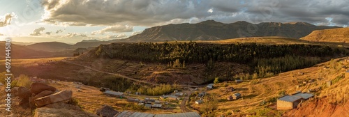 Panorama of Daliwe village in the Lesotho mountains at golden hour, Africa photo
