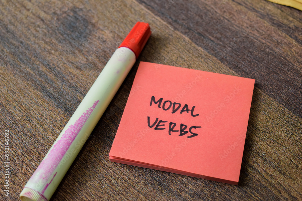 Concept of Modal Verbs write on sticky notes isolated on white ...