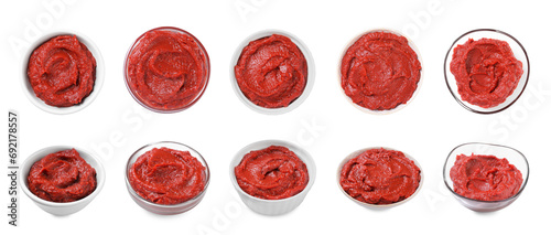 Tasty tomato paste in bowls on white background, set with top and side views © New Africa