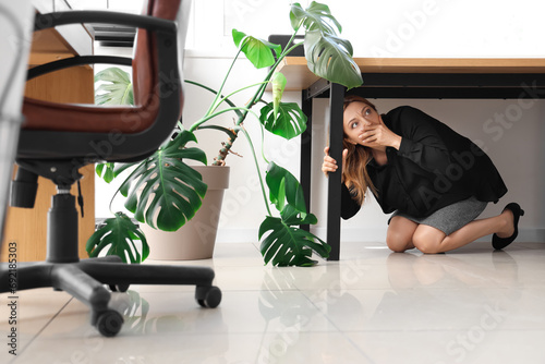 Scared mature businesswoman...