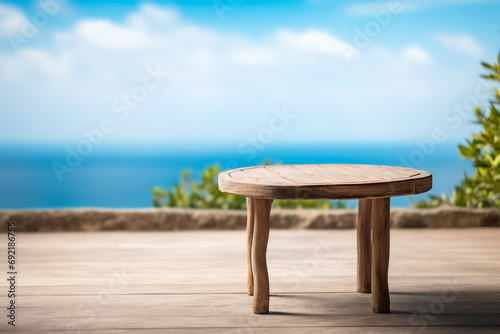 Empty wooden table against the background of the ocean.