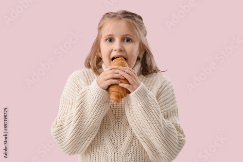 Cute little girl with crois...