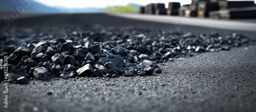 Asphalt concrete mixes mineral materials Pile of gravel crushed stone sand mineral powder and building material for the production of asphalt Territory of the asphalt concrete plant. Copy space image