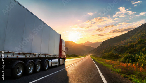 Truck driving on the road at sunset, transportation and logistics concept photo
