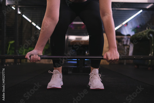 Woman's Hand Grasping Barbell for Deadlifts